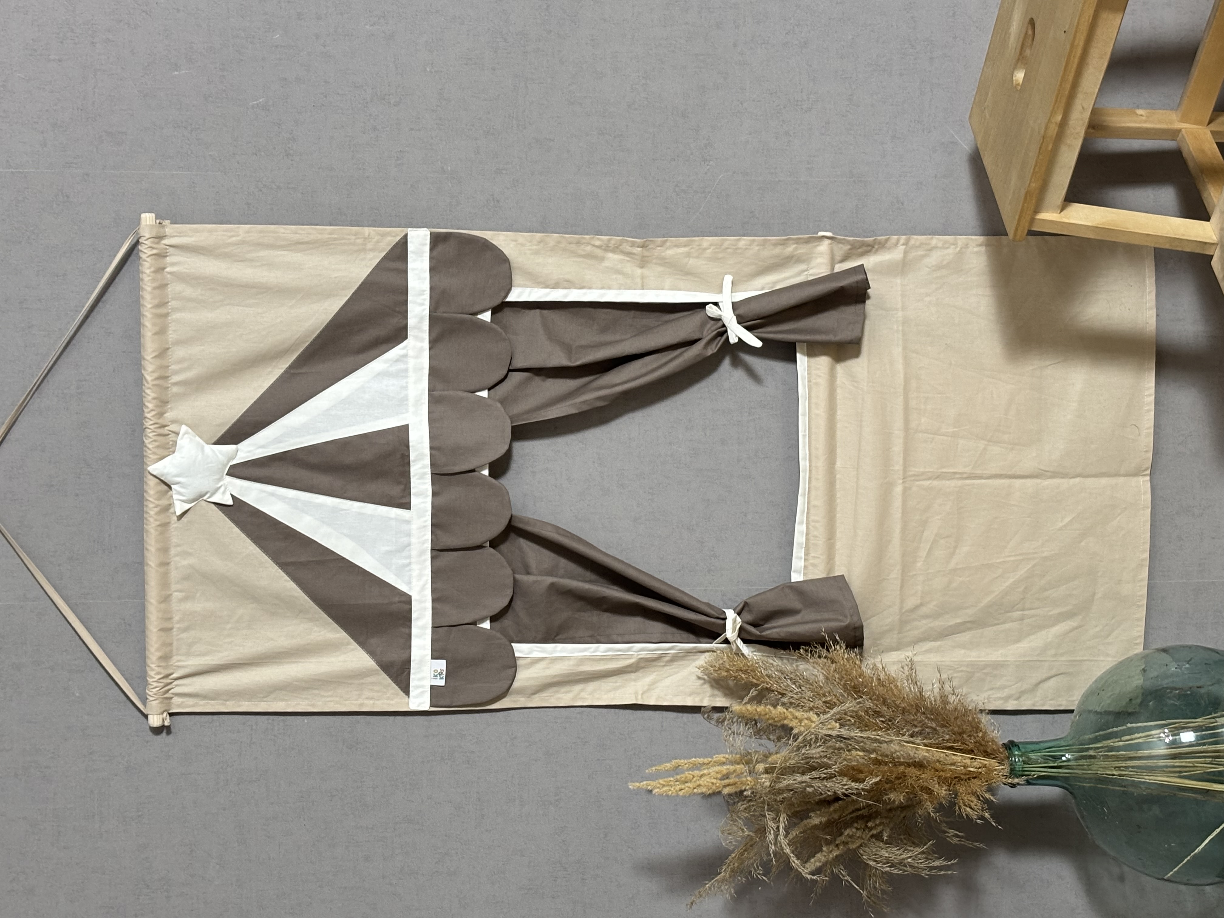 Puppet theater with brown curtains