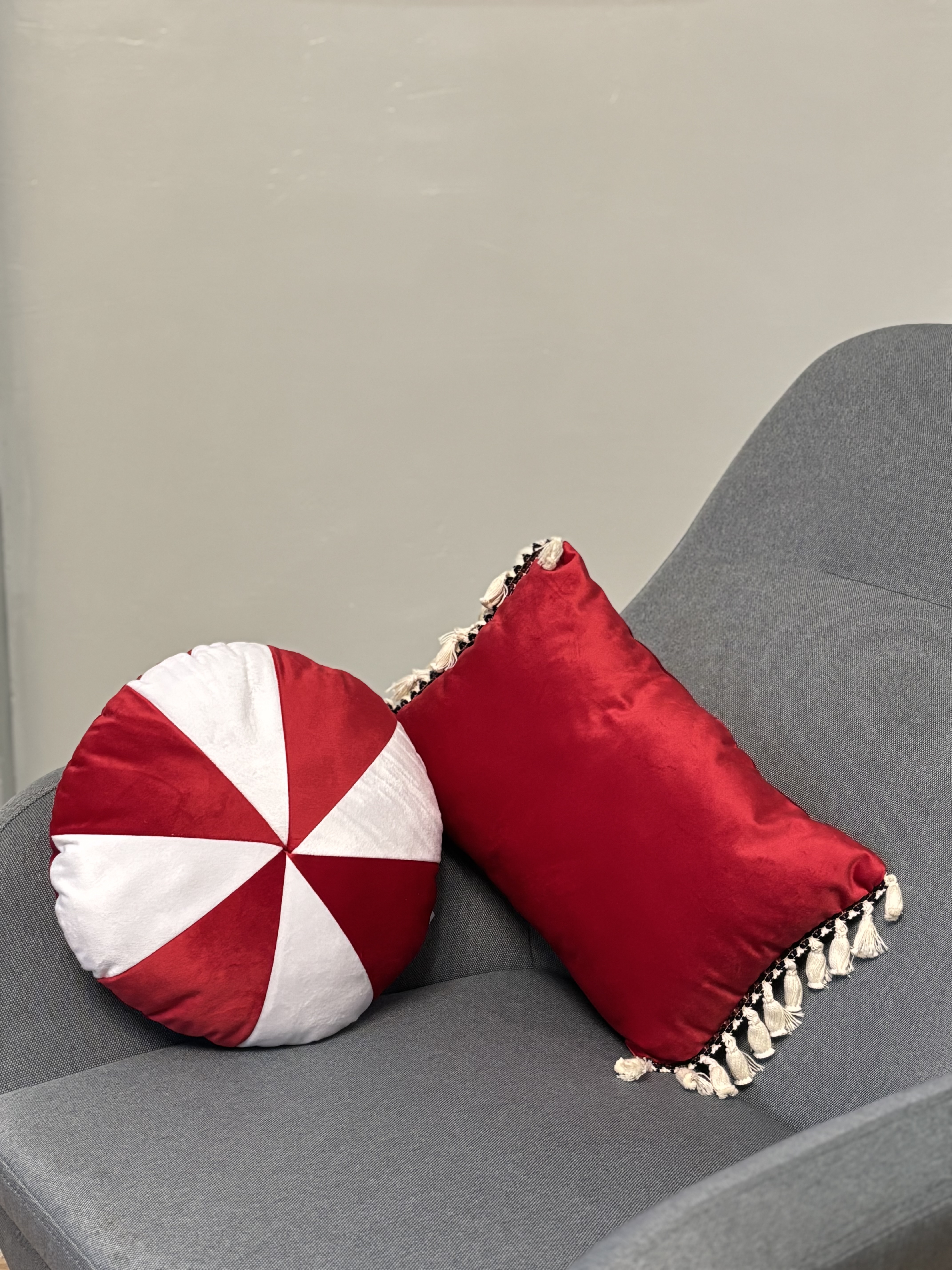 Round red velvet pillow