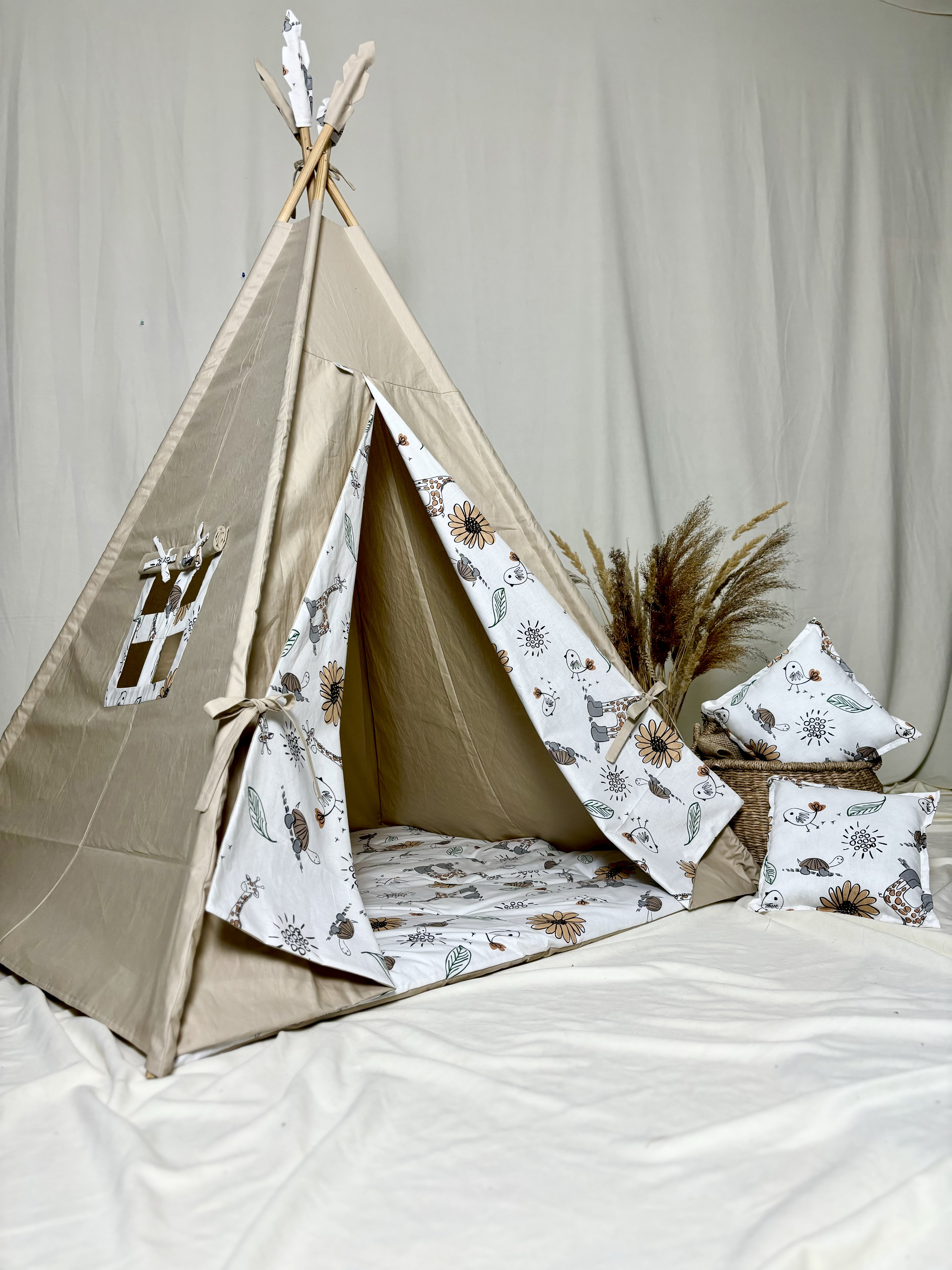 Beige tent with giraffe and floral print