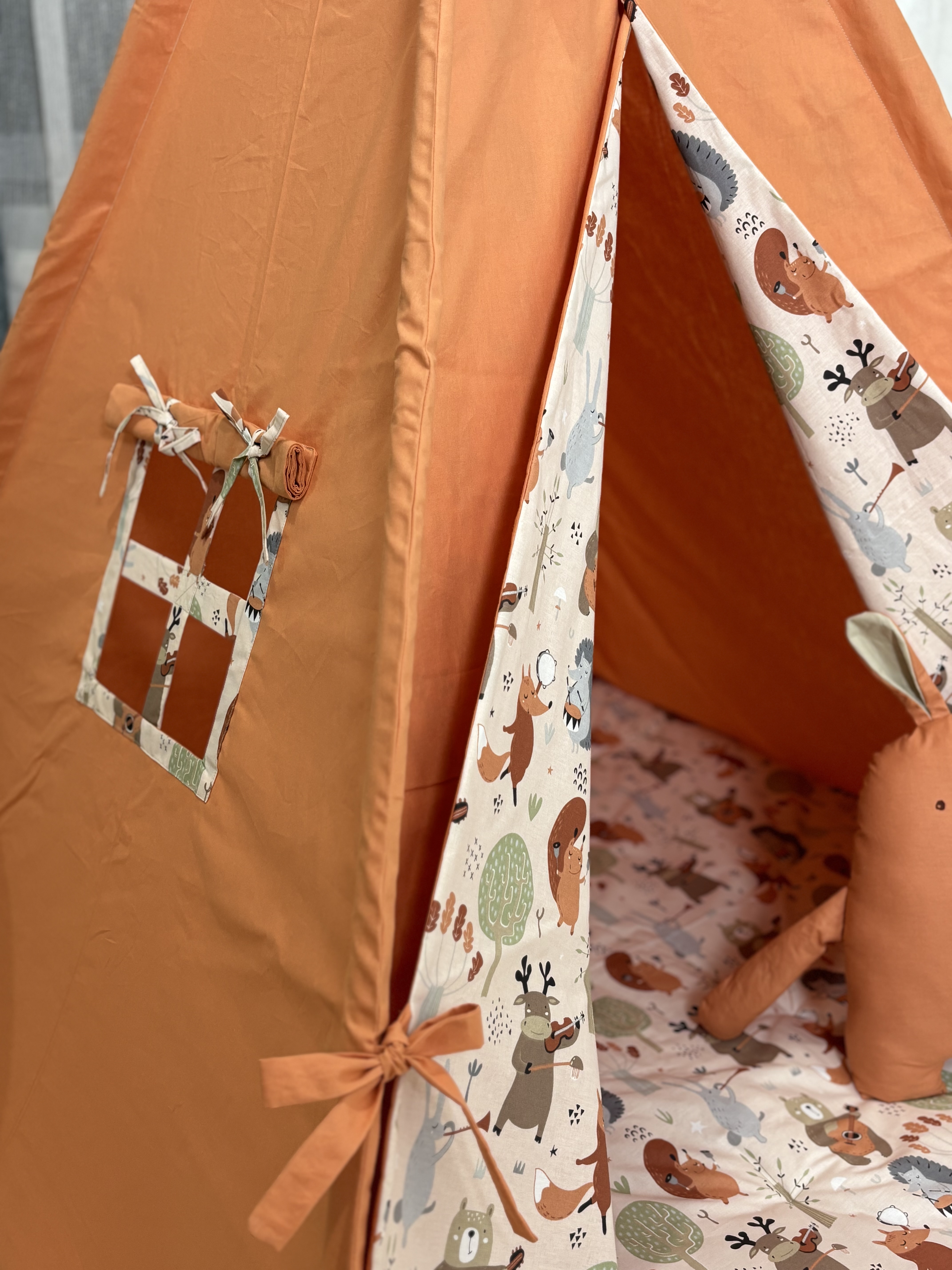 A brick tent with a rabbit