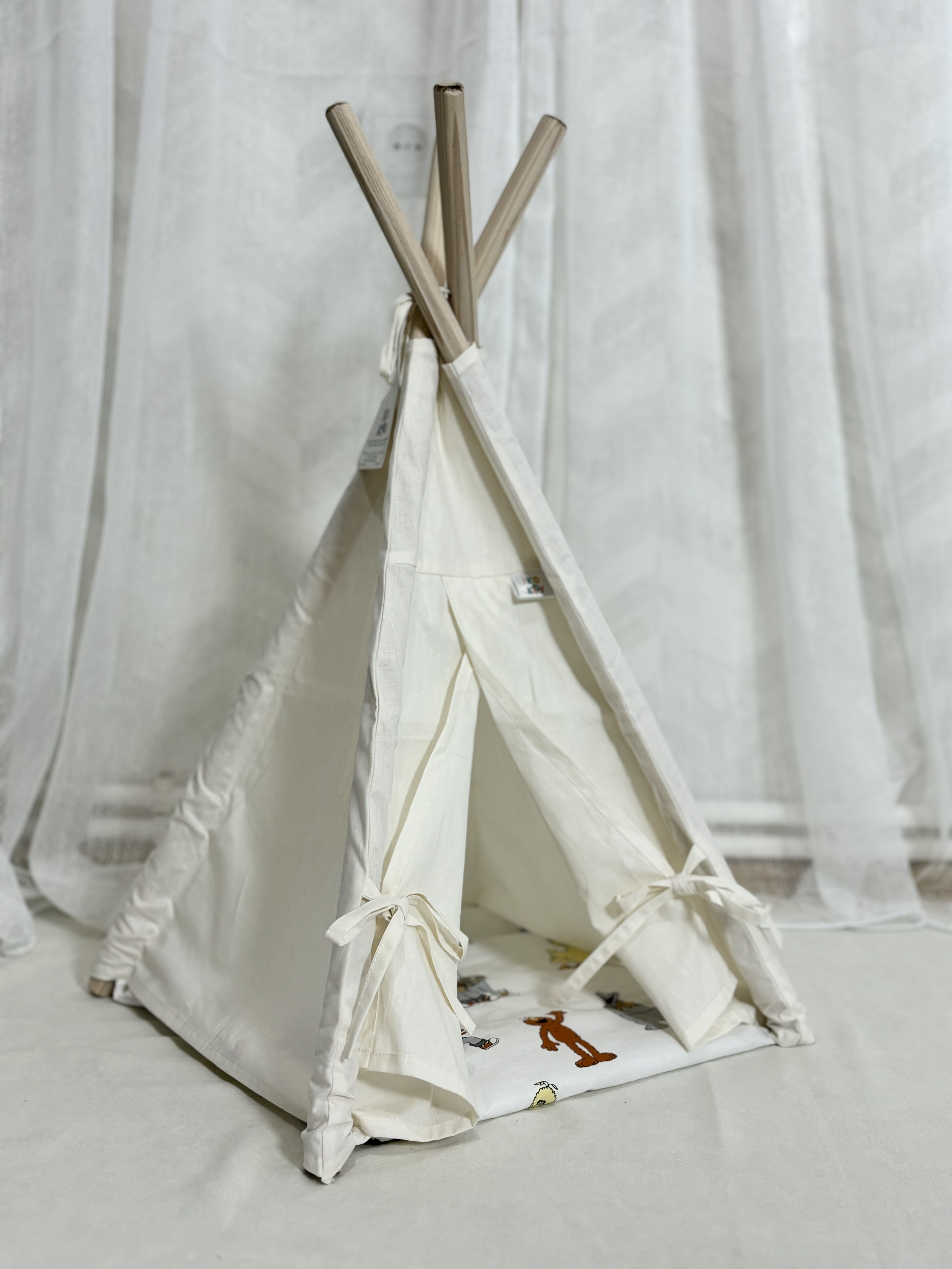 A small white tent for dolls