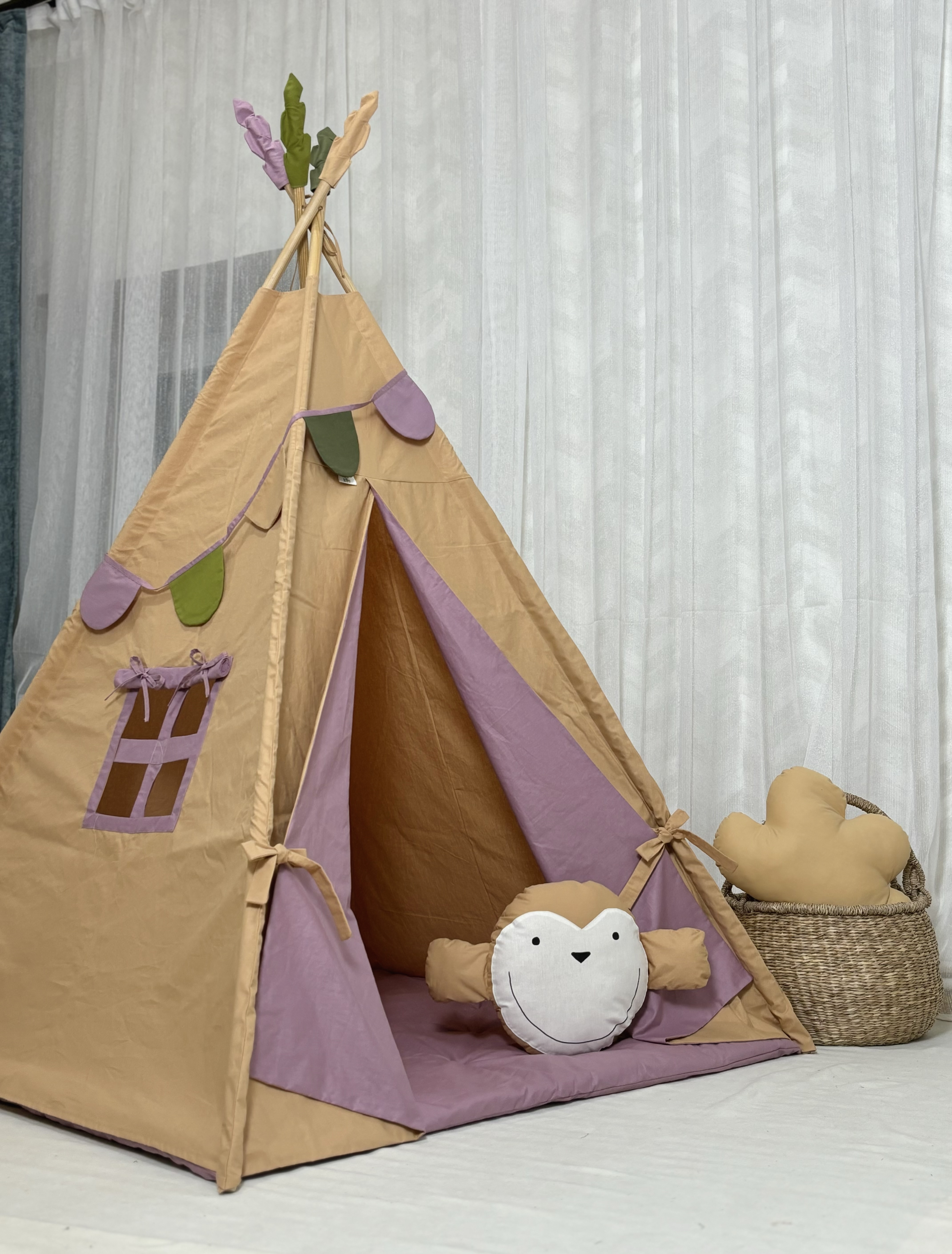 Mustard colored tent with purple covering